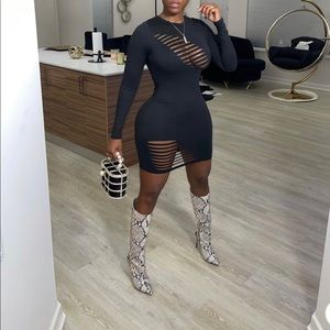 Black long sleeve midi dress purchased from Benton 1988. Tried on couldn’t fit.